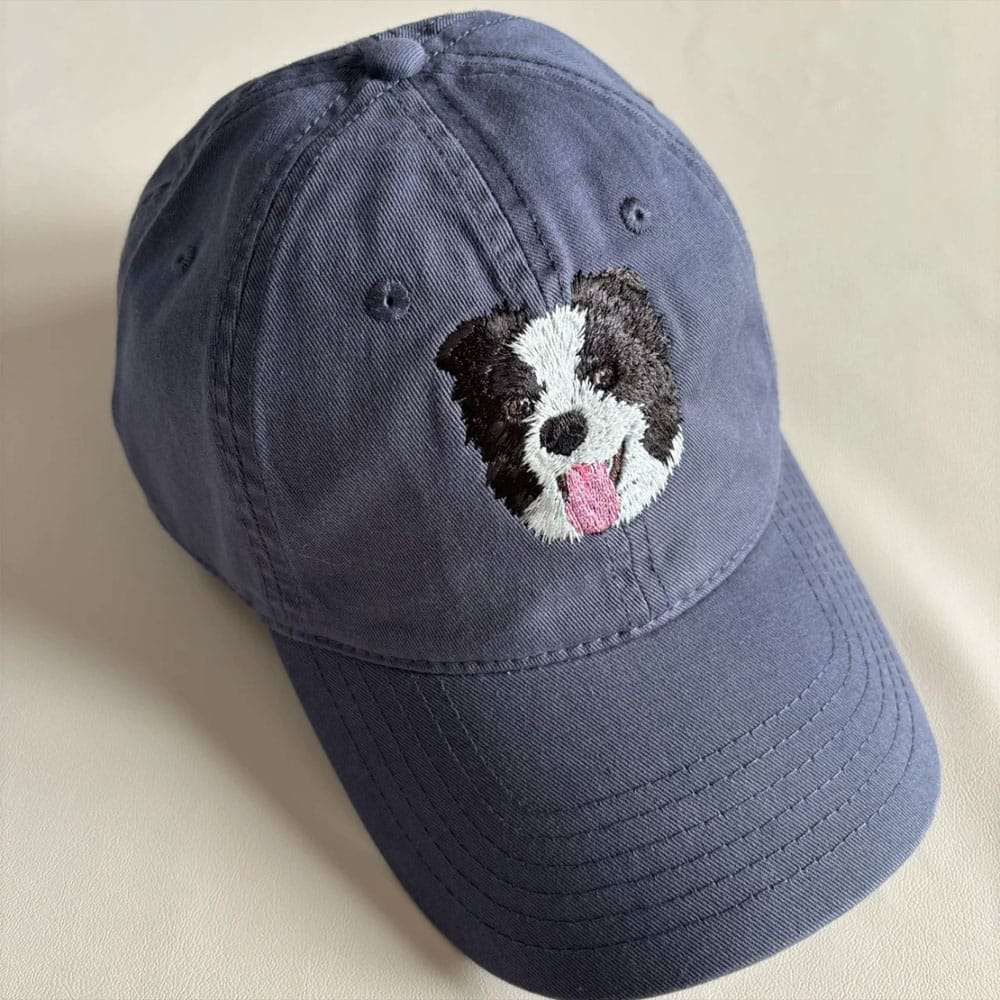 A custom embroidered hat featuring a detailed pet portrait.