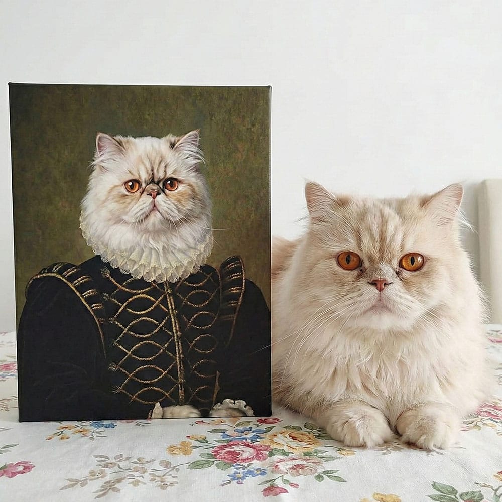 Cat with a portrait of itself in regal attire on a floral bedspread.