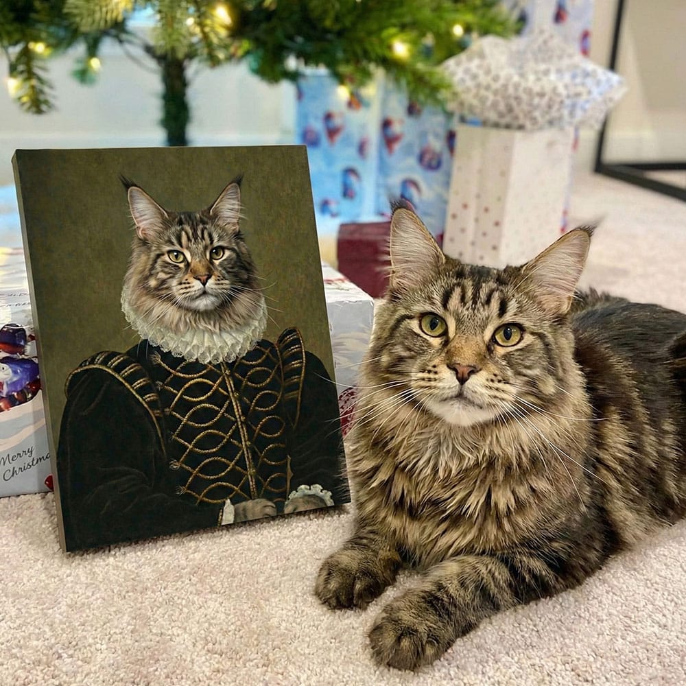 Cat sitting next to a portrait of itself in a suit, with Christmas decorations in the background.