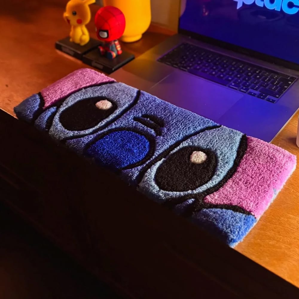 Handmade custom tufted keyboard rugs designed as cartoon characters.