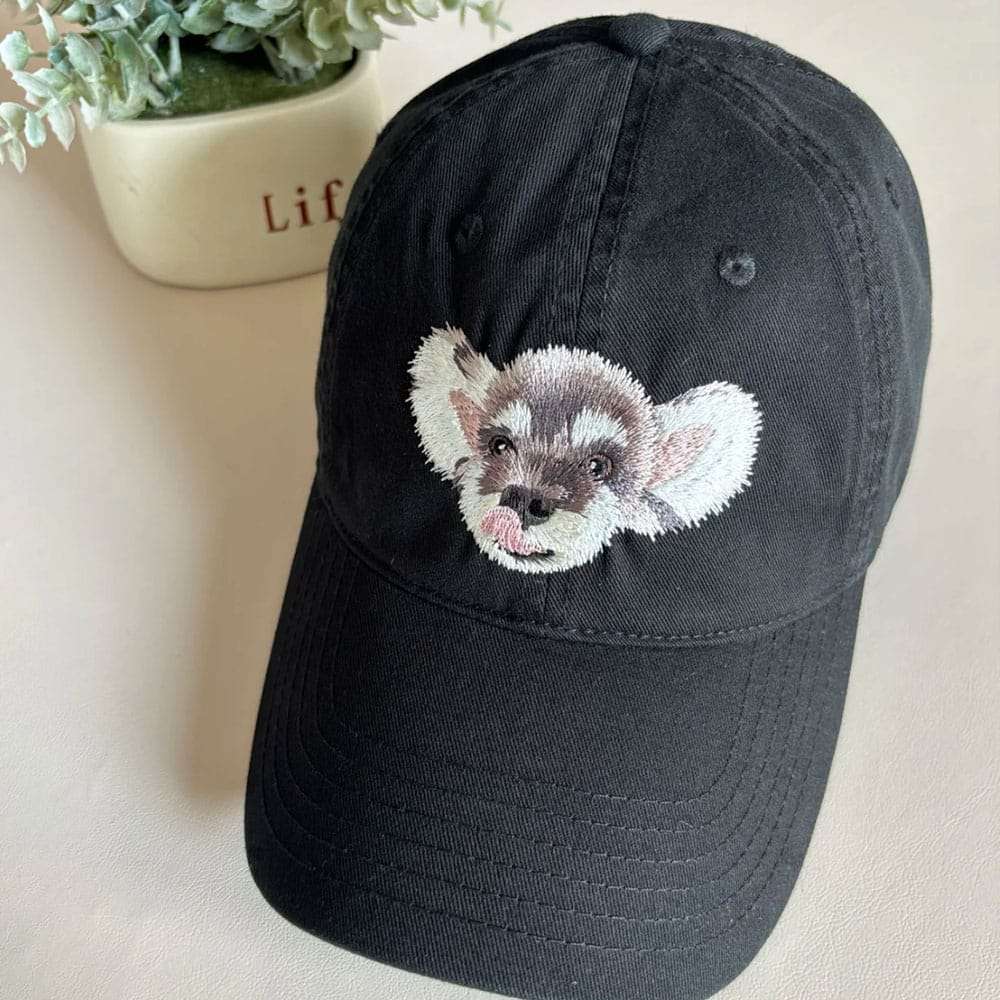 A custom embroidered hat featuring a detailed pet portrait.