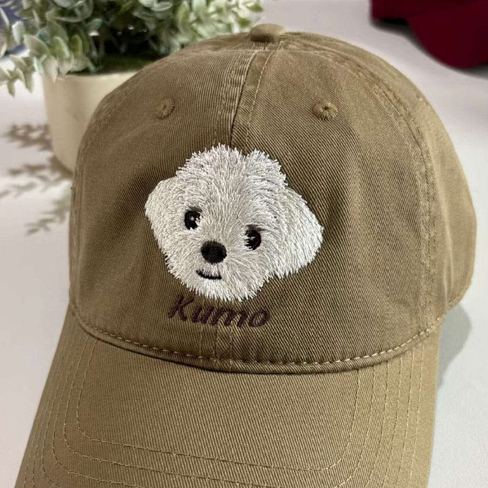 A custom embroidered hat featuring a detailed pet portrait.