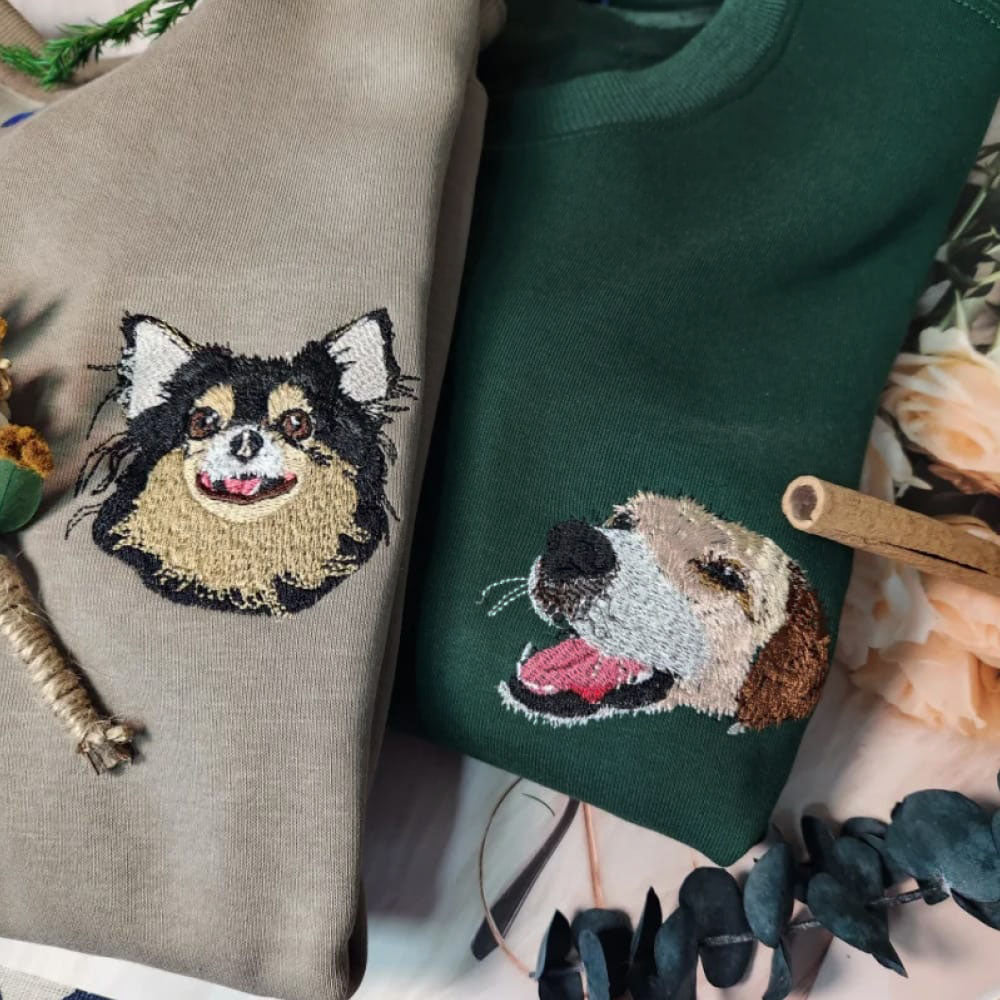 A custom sweatshirt featuring a detailed embroidered pet portrait.