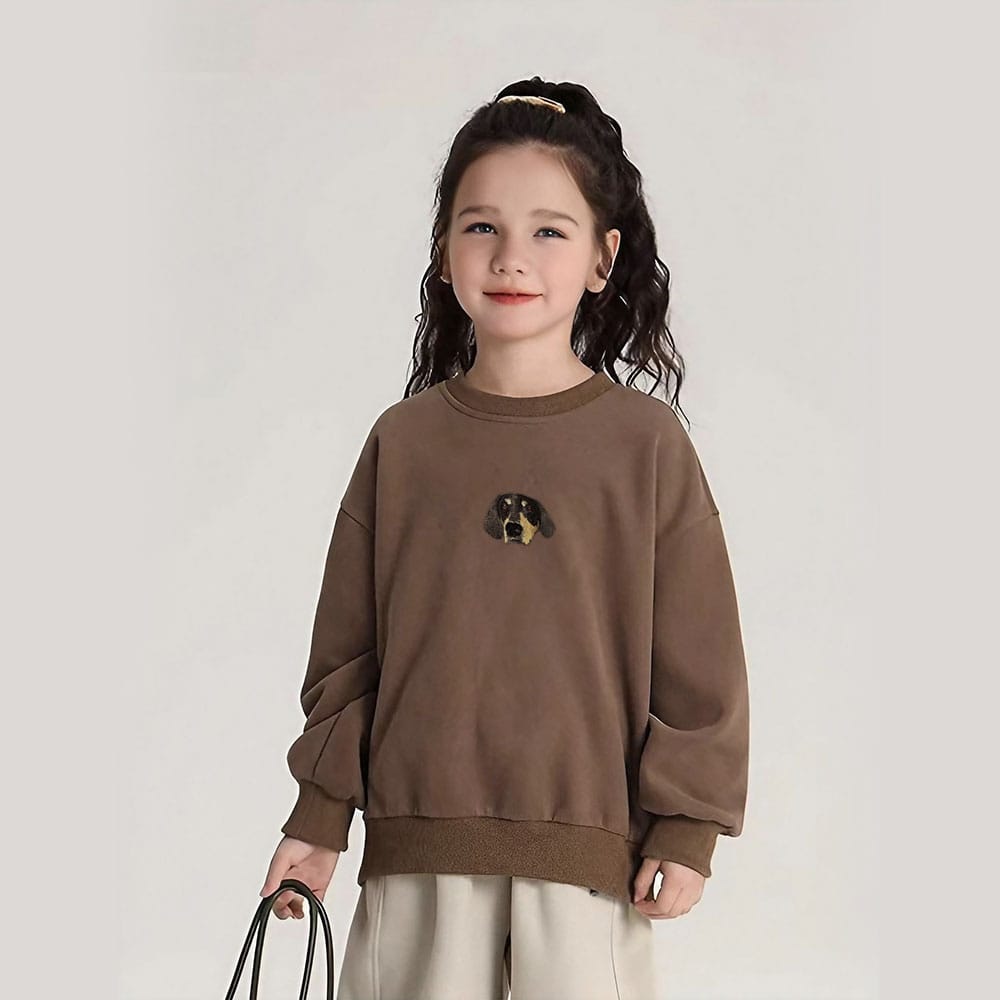 A custom brown embroidered pet portrait sweatshirt designed for kids.