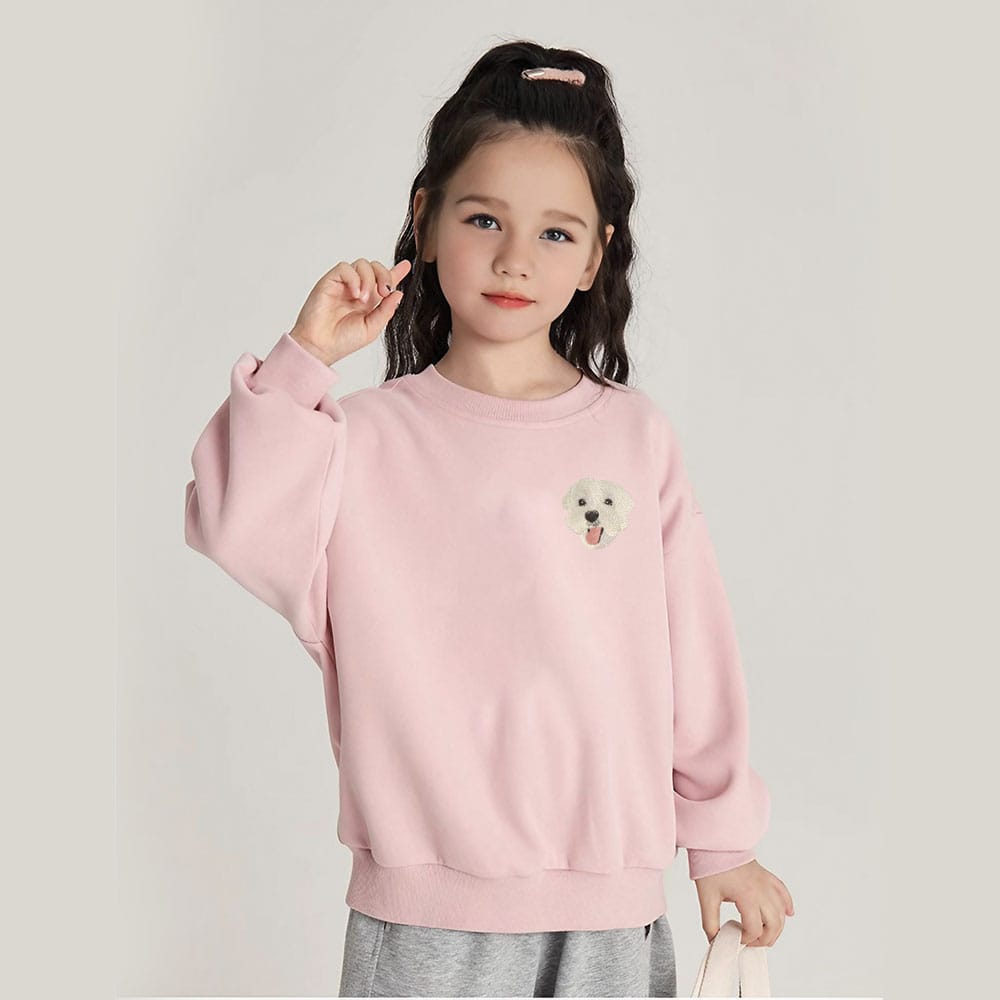 A custom pink embroidered pet portrait sweatshirt designed for kids.
