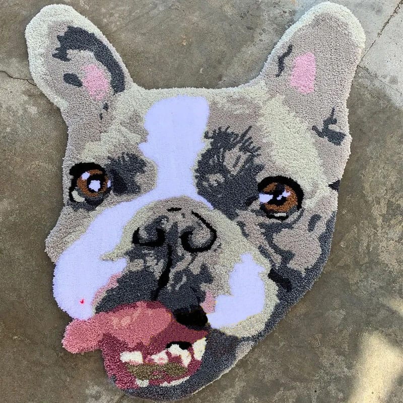 A handmade custom tufted rug designed to look like a pet's portrait.