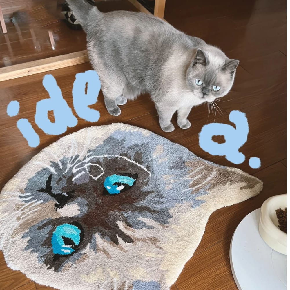 A handmade custom tufted rug designed to look like a pet's portrait.