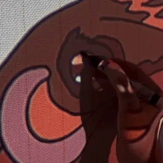 Handmade process of creating a custom pet portrait tufted rug.