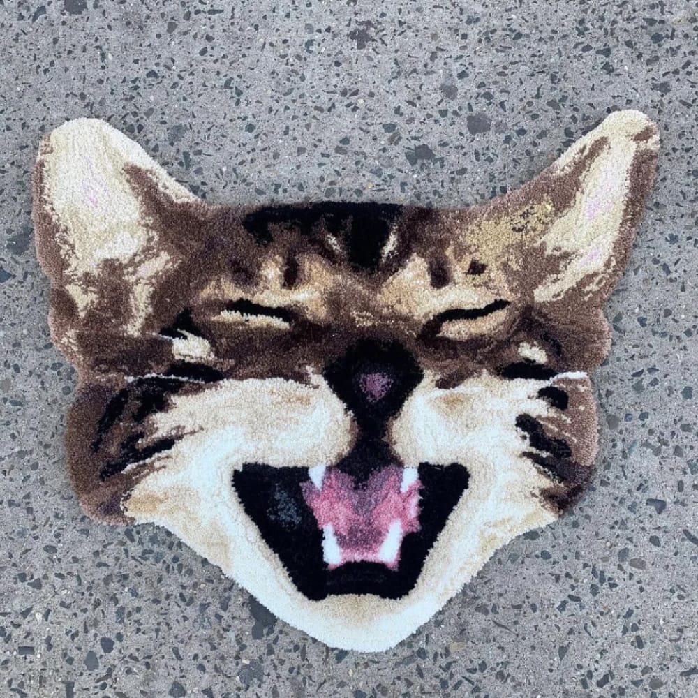 A handmade custom tufted rug designed to look like a pet's portrait.