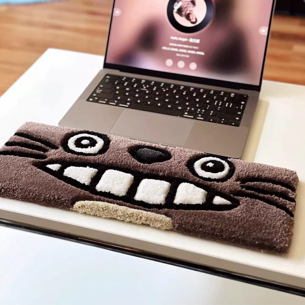 Handmade custom tufted rug designed as a decorative keyboard mat.