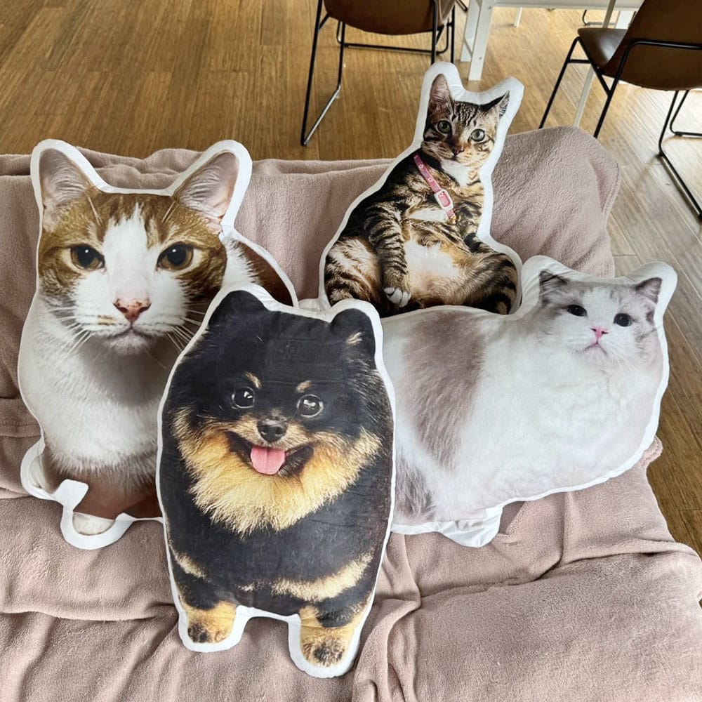 Custom shaped pillow designed to look like a pet portrait.