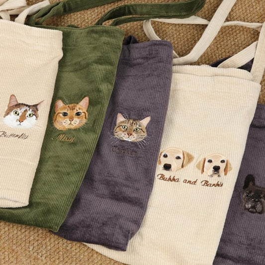 A custom embroidered pet portrait on a stylish corduroy bag.